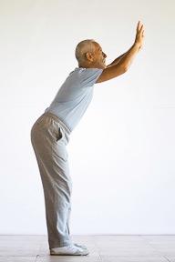3. Bend forward from your waist.