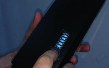 The light on the charger should be RED, and that light will change to GREEN when the battery is fully charged.