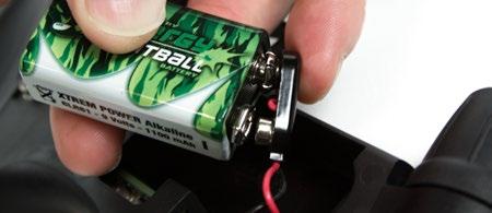 If present, remove the existing 9 volt battery by sliding your thumb or finger into the recess provided at the bottom of the battery and lever the battery