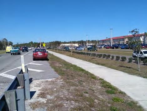 5 miles in length. It was observed that some parents pulled up next to the guard rail on Belle Terre Parkway to avoid waiting in this queue.