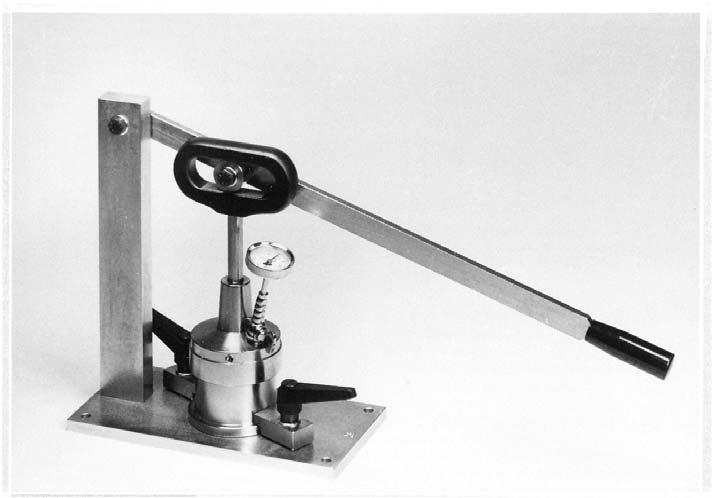 FIG. A.4 Manual Grease Worker A.7 Grease Cutter, having a sharp, rigidly mounted, beveled blade, shall be essentially as shown in Fig. A.6.