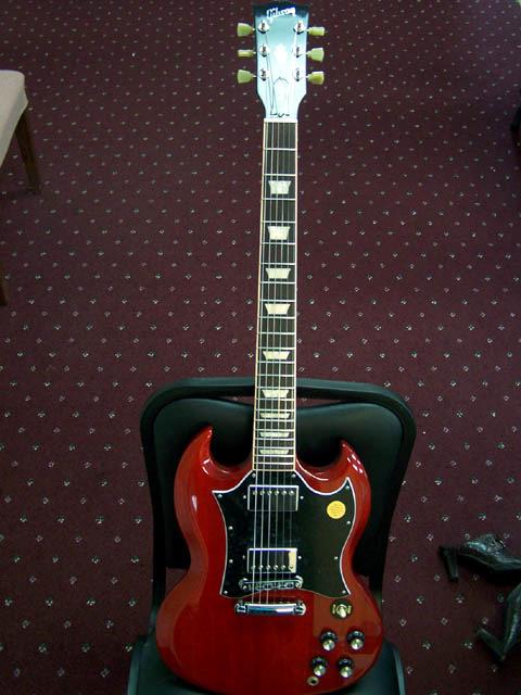 Item #BP10-20 Red Gibson SG Standard Guitar The Original Double-Cutaway Rocker, Loaded for Tone and Ready for Action!