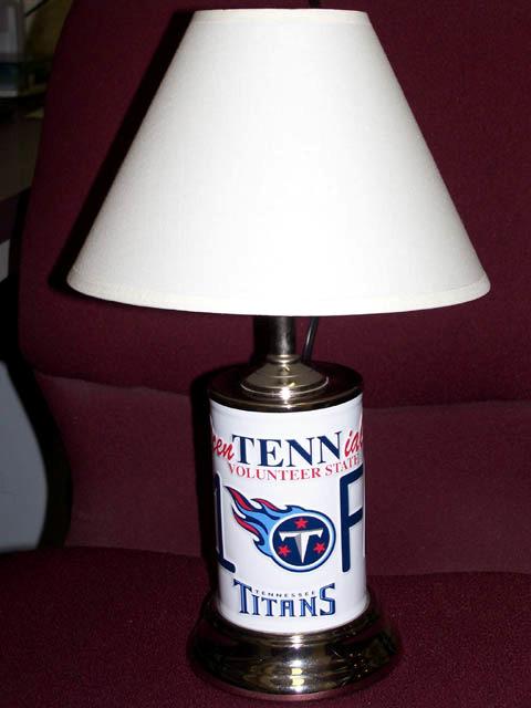 Item #BP10-22 Titans Accent Lamp Perfect for a small table, desk, or dorm. Sixteen inches high, the base appears as a Tennessee license plate inscribed with #1 FAN.