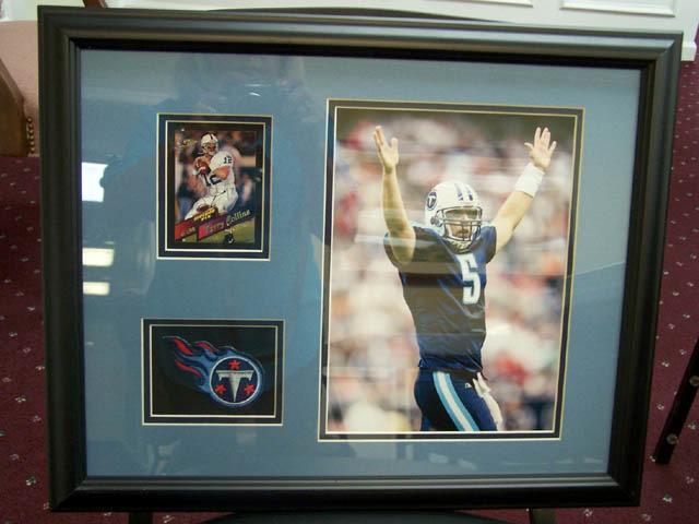 Item #BP10-15 Kerry Collins Matted and framed to 14x18, this piece features a certified autographed card of Kerry Collins from his rookie year. The 1995 Superior Pix card is limited to 5000.