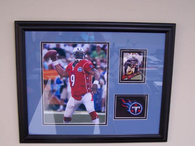 Item #BP10-16 Steve McNair Matted and framed to 14x18, this piece features a certified autographed card of Steve McNair from his rookie year.