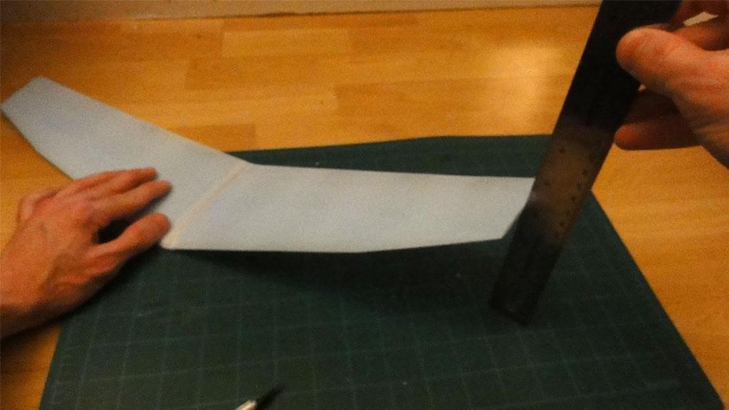 Wing Installation: Flip the wing upside down and place it on your cutting board.