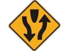 WHAT IS THE MEANING OF THIS SIGN? A. THE TRAFFIC SIGNAL AHEAD IS RED. B. THE TRAFFIC SIGNAL AHEAD IS BROKEN. C. THE TRAFFIC SIGNAL AHEAD IS GREEN. D. THERE IS A TRAFFIC SIGNAL AHEAD. 25.