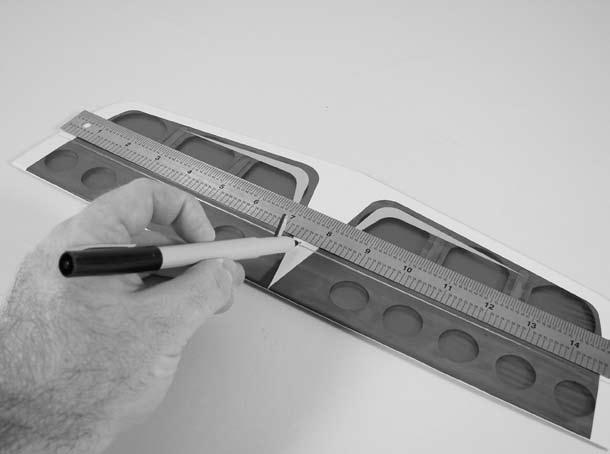 Use a ruler to determine the center of the stabilizer.