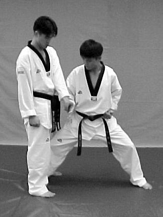 Master Chong s World Class Tae Kwon Do Self Defense Against a Single Hand Wrist Grab Attacker: Grab partner s right wrist with your left hand.