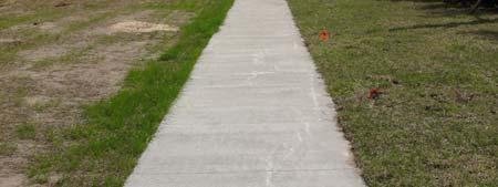 There is a gap in the sidewalk near the service area Xxxxxxxxxxx A new sidewalk connects the Oakbrook development to the School House Drive sidewalk Finding: Currently,