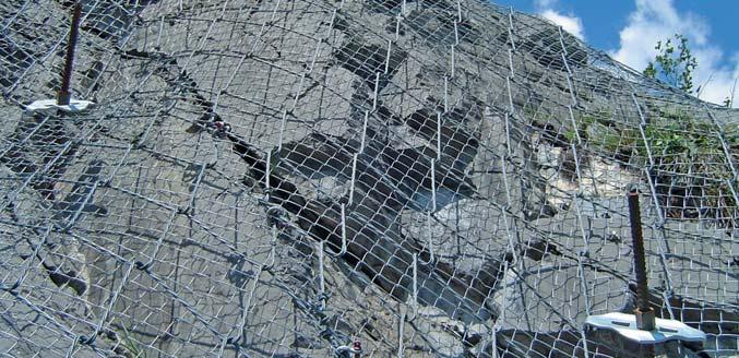 1 2 One system, two protection concepts The SPIDER spiral rope nets are secured over rock nails with spike plates or, as the case may be, to rock anchors against the rock surface.