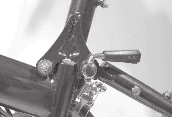 As you unfold your bike, make certain the cable housing that goes around the bottom bracket does not get hung up on Fig. 7 Unfold your bicycle. the left crank arm or hinge. 8.