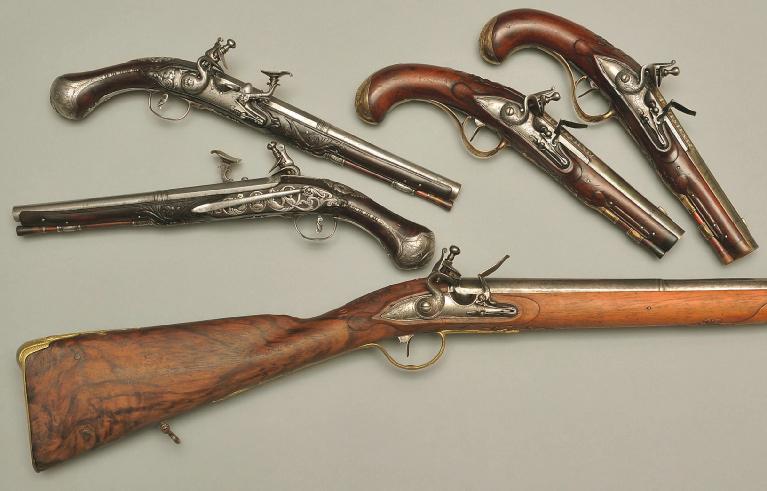 A pair of snaplock pistols, Italy around 1680. Signed ACQUA FRESCA on the lock plates. Lock and fittings with excellent iron engraving. Pair of flintlock pistols, German around 1740. Signed C.