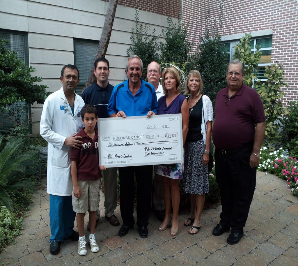 7 Pro Shop Patrick Beale Memorial Golf Tourney Donation A check was presented to MUSC Hollings Cancer Center for $10,000.