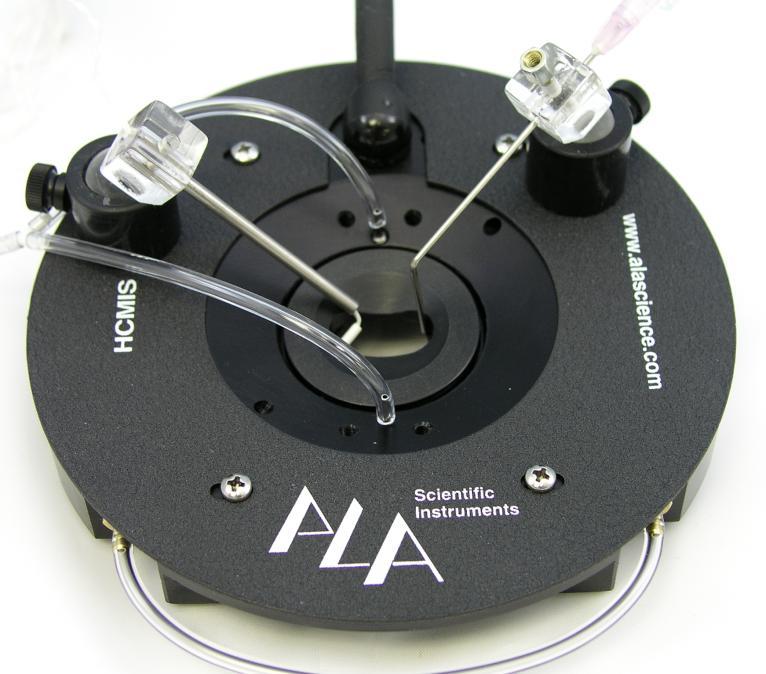 Product Overview and Instructions HC-MIS: shown at left with optional magnetic plate and magnetic swivel tools from ALA (MU-TOOL holding a thermistor sensor, and stainless steel perfusion canula).