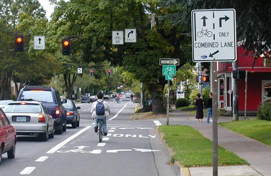Suggested bike lane within motor vehicle turn lane Signage to encourage proper