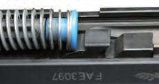 Insert the recoil guide rod assembly: P99 Full Size: Place the smaller (black) end of the recoil rod into the spring mounting at the front of the slide, and then insert the large polymer end of the