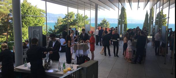 In the warm season, the Gallery opens into a terrace with a panoramic view of the lake and the Alps.