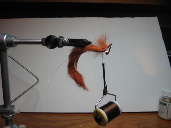 barred Sili Legs Flash: Copper Flashabou Coller: Brown Marabou Step 1 - Place cone on hook and place hook in vise with point down.