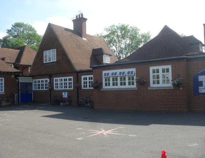 School location The school is in a rural, village location, approximately a mile from Gatwick airport runway as the crow flies.