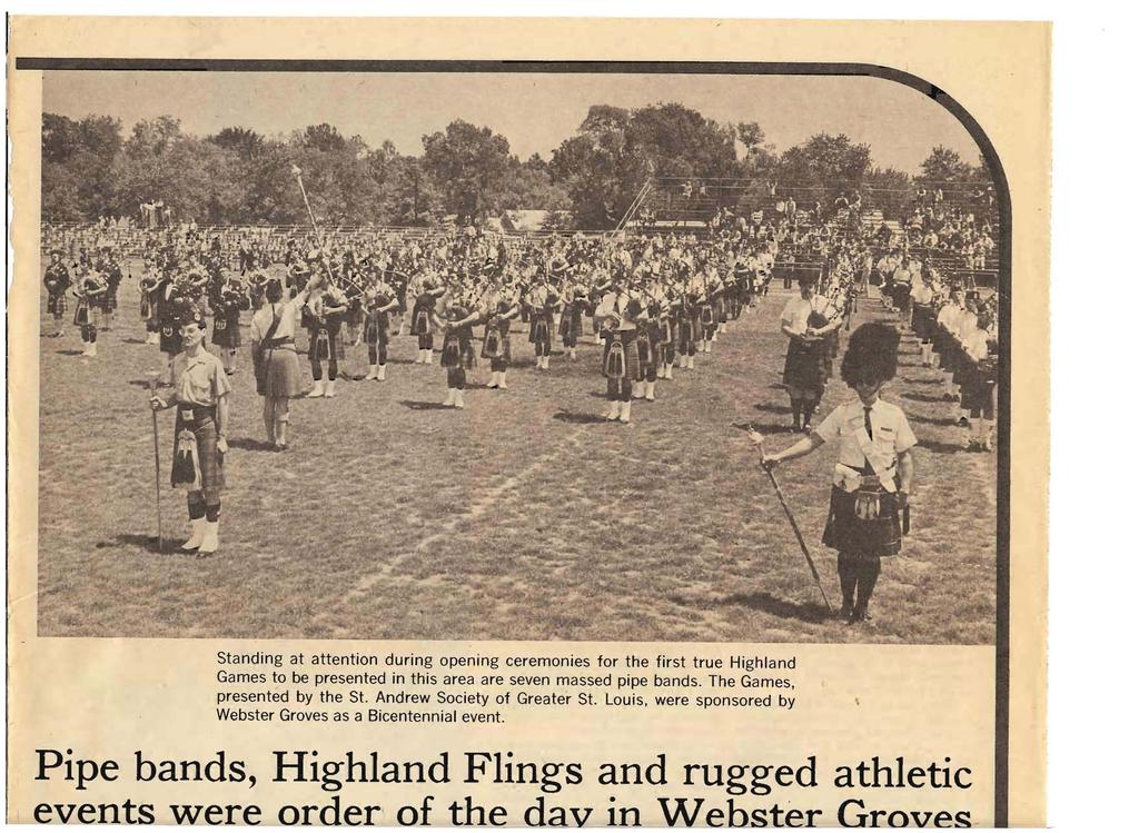 Standing at attention during opening ceremonies for the first true Highland Games to be presented in this area are seven massed pipe bands. The Games, presented by the St.