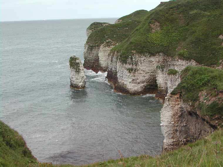 seawards form an unstable overhanging cliff Rock strata dipping landwards form