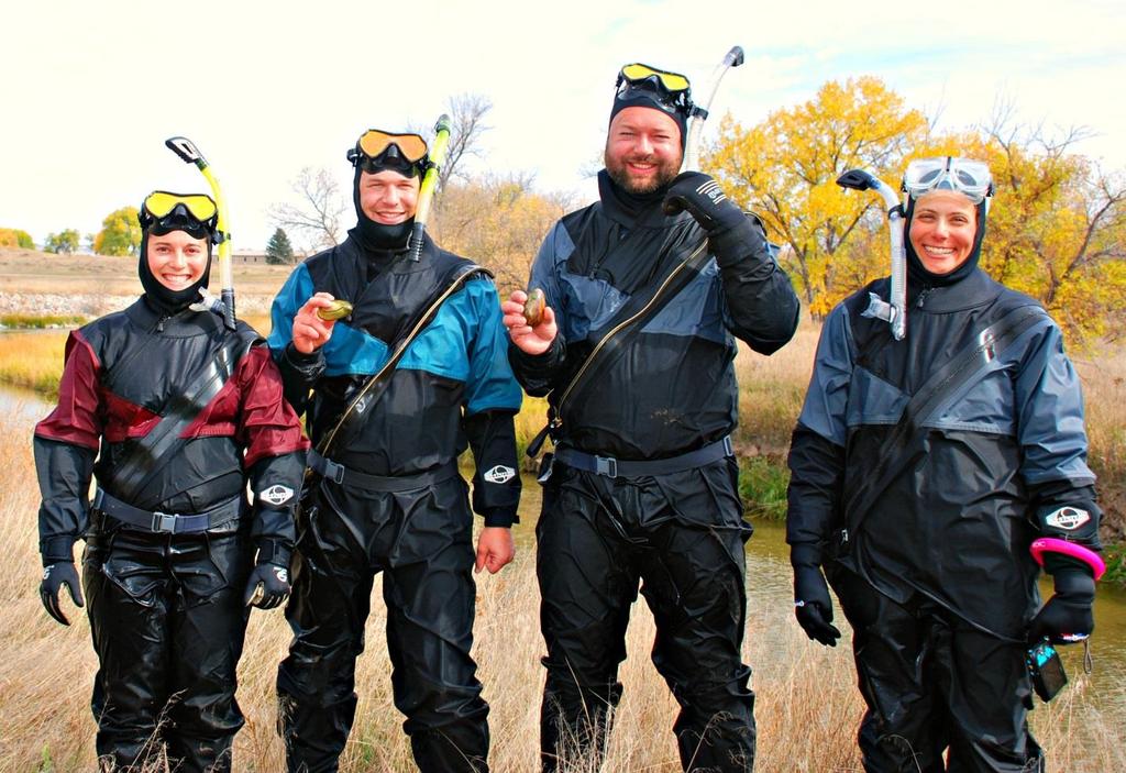 ON THIS PAGE The native mussel crew from the Wyoming Game and Fish Department (left to right, Meghann Karsch, Phil Mathias, and Jon Mageroy) and Lusha Tronstad of the Wyoming Natural Diversity