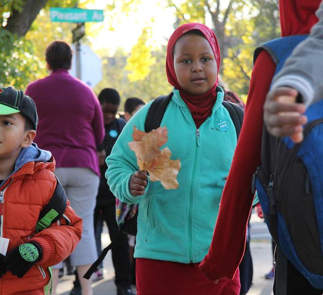 SMALL ACTION, BIG IMPACT PROGRAM SPOTLIGHT BUS STOP & WALK A Bus Stop & Walk program allows students who live too far from school to enjoy the experience of walking to school.
