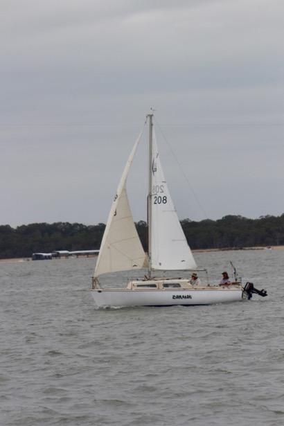 Sirius skippered by Mike Stephens crosses the the finish line at the head of the fleet.