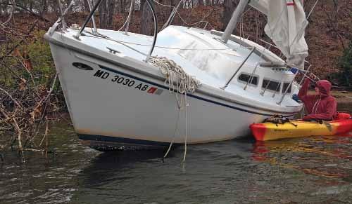 photos courtesy of Maryland has a law that enables people to rescue abandoned boats.