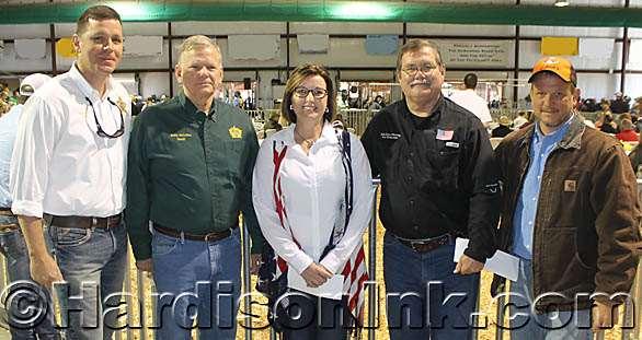 Madison Starnes stands with buyers of her Reserve Champion Homegrown Feeder Steer. Five of the many elected officials (and livestock buyers) at the SFR are seen here.