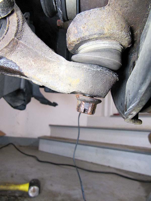 #10 Loosen the lower ball joint nut, but don t remove it completely (to keep the