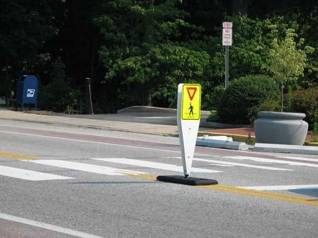 Alternative Traffic Calming Methods In-street Pedestrian Crossing Sign Cost: approximately $300 per sign not including the installation cost Advantages of in-street pedestrian crossing signs 1.