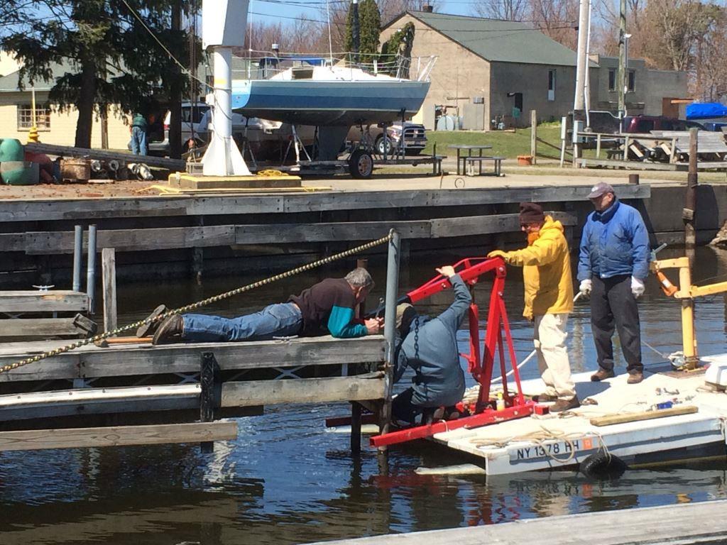 Eric Matteson led a crew on Saturday April 19 th who worked most of the day to straighten the South Shore docks. Thanks to everyone who helped out.