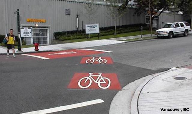 much preferred, many cyclists may not be aware of this possibility. We suggest formalizing a two stage turn queue to facilitate this maneuver.