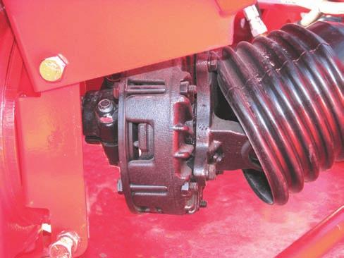 Section 3 - Mower Preparation 22. Ensure the driveline clutches will slip under an excessive load by checking that there is a gap between the tabs of the pressure plate (1) and the clutch housing (2).