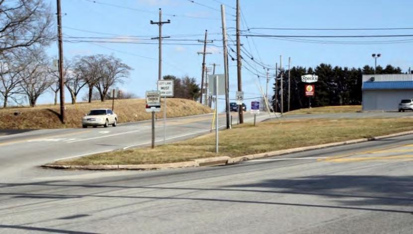 Figure 14: Lower Providence Gateway Concept The top photograph in Figure 14 illustrates the current environment at the intersection of Germantown Pike and Ridge Pike.