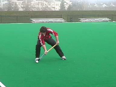 be rotated toward the round face of the stick) Player bursts away from check towards ball Just before reception player stops forward momentum and assumes low body position.