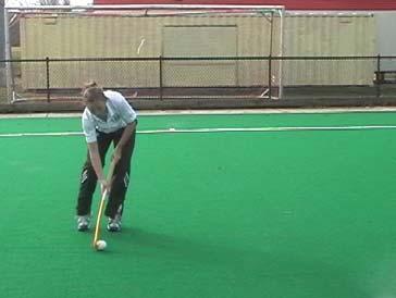 Position: Beside the body Middle of the stance or closer to the right (back) foot Eyes on the ball Low, weight on back (right) foot, knees bent Side on to