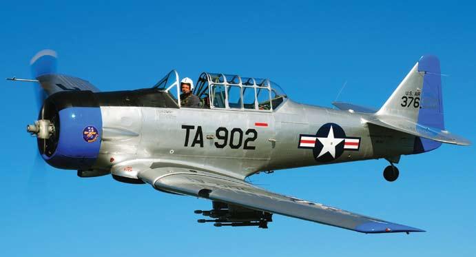 TRAVIS REYNOLDS Keiths flies the SBD Dauntless. Keith at the controls of the LA-T6 Mosquito painted in Korean War colors.