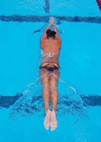 Child should be able to propel themselves on a kick board or while holding a water polo ball using fast little flutter kicks.