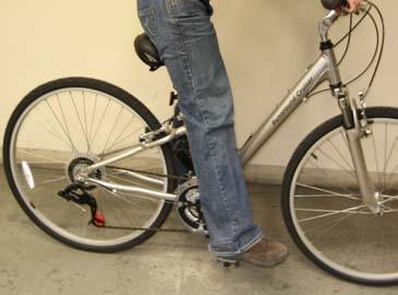 4. INSTALL SADDLE AND ADJUST SADDLE HEIGHT. If the seat and seat post were removed for shipping, insert the seat post into the seat post tube.