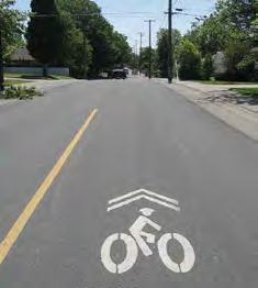protectio of bicyclists. Ca be physically separated by a barrier, such as platers or o-street parkig, or grade-separatio from the roadway.