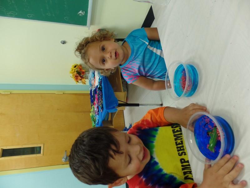 Our bunk did a really fun project with Morah Nomi this week we made snow globe aquariums using colored water, a submarine, and glitter. The campers loved shaking them.
