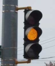 Yellow Traffic Symbol (Yellow Light) A yellow traffic light indicates that drivers should reduce their