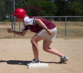 When the pitching arm reaches the highest point of the arc, begin the rocking movement. Transfer body weight to the back foot to enable an explosive drive from the sprint position.