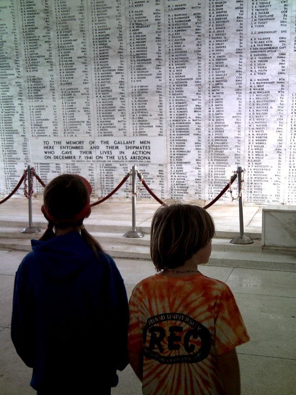 Maddy and Sam in the shrine in the memorial on which are all of the names of those who died in the attack on Pearl Harbor.