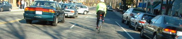 Lane Control = Defensive Cycling Motorists often misjudge space when: Lane is narrow and Cyclist is at right edge of lane Riding near center of narrow lane reduces unsafe passing, sideswipes Photo:
