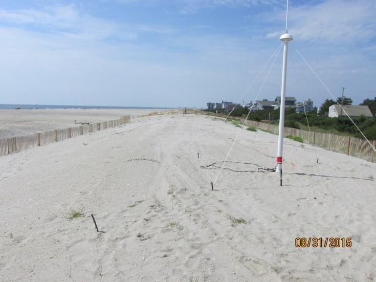 Right photo was taken August 31, 2015 and shows the impact of the federal project. The dune was rebuilt and combined with a 500 foot wider dry beach. Figure 86.