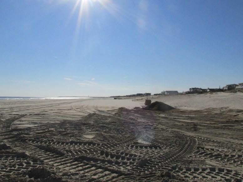Beach changes prior to the federal project arriving amounted to typical summer beach accretion with few other impacts. The federal sand added 109.72 yds 3 /ft.